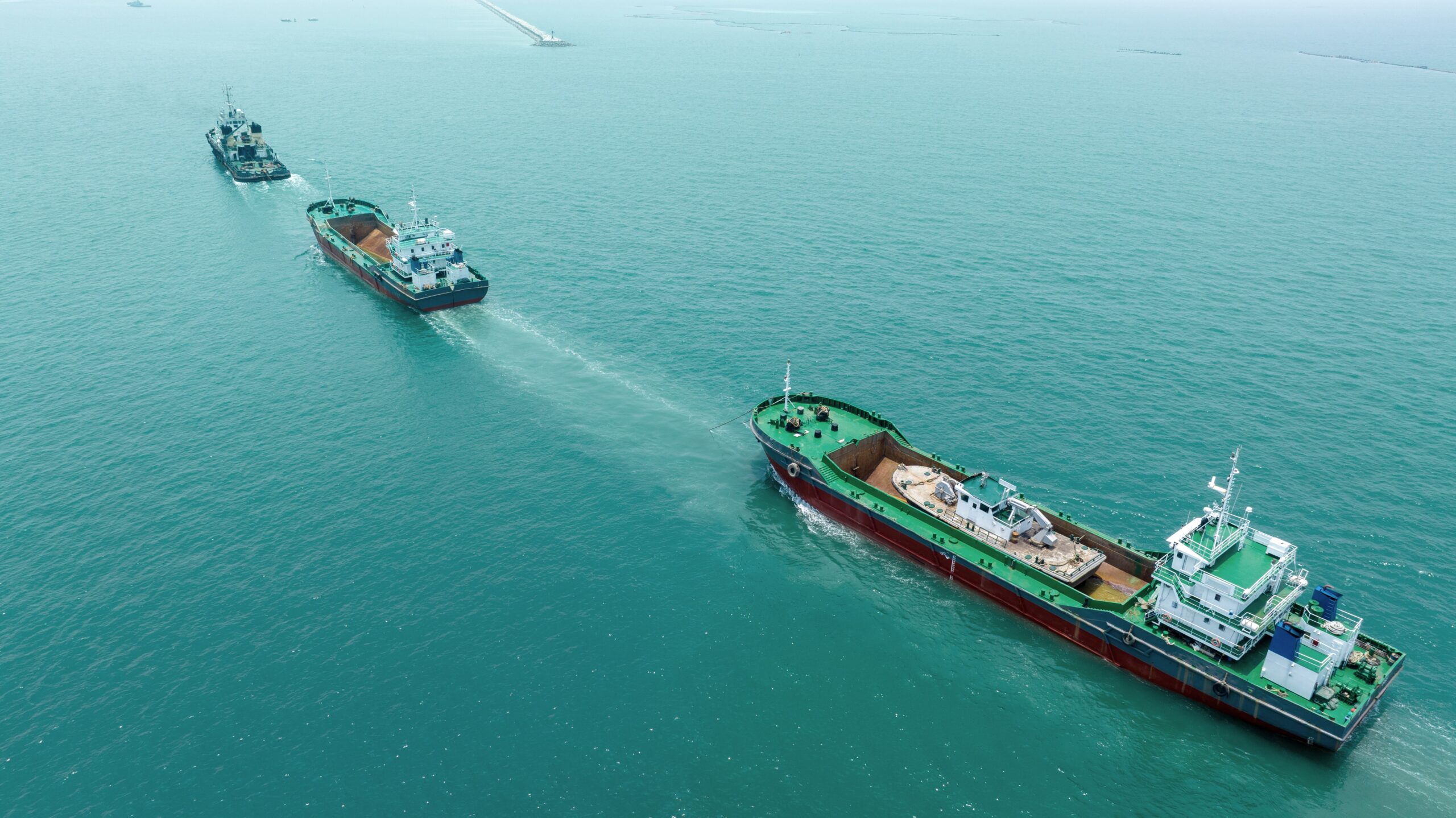tug-boat-drag-3-cargo-ship-in-the-ocean-3-ship-ru-2023-11-27-04-52-19-utc-min